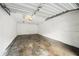 Bright garage featuring concrete flooring and white walls at 201 Laurel # 308, Tampa, FL 33602