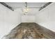 Spacious garage with white walls and concrete flooring at 201 Laurel # 308, Tampa, FL 33602