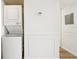 Laundry area with white stacked washer and dryer at 201 Laurel # 308, Tampa, FL 33602