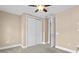 This cozy bedroom has a large closet and access to an ensuite bathroom at 2226 Soho Bay Ct, Tampa, FL 33606