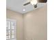 This neutral bedroom offers great natural light and features a ceiling fan at 2226 Soho Bay Ct, Tampa, FL 33606