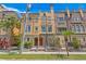 Charming townhome with stone accents and a landscaped front yard, perfect for curb appeal at 2226 Soho Bay Ct, Tampa, FL 33606