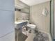Modern bathroom featuring a sleek vanity, square tile and contemporary fixtures at 3301 Bayshore Blvd # 2003D, Tampa, FL 33629