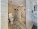 Contemporary bathroom featuring tiled walls, a glass-enclosed shower, and stylish fixtures at 3301 Bayshore Blvd # 2003D, Tampa, FL 33629