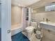 Full bathroom featuring tub/shower combo, square tile and a modern vanity at 3301 Bayshore Blvd # 2003D, Tampa, FL 33629