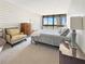 Serene bedroom with a large window view, comfortable furnishings, and soothing decor at 3301 Bayshore Blvd # 2003D, Tampa, FL 33629