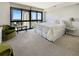 Bright bedroom with floor to ceiling windows offering city views, carpet and neutral tones at 3301 Bayshore Blvd # 2003D, Tampa, FL 33629