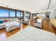 Spacious living room featuring hardwood floors, plush seating, and an open layout with water views at 3301 Bayshore Blvd # 2003D, Tampa, FL 33629
