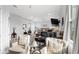 Large main bedroom featuring a king bed, arm chairs, and a desk at 3610 Gulf City Rd, Ruskin, FL 33570