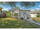 Well maintained front yard with mature landscaping at 3611 4Th N Ave, St Petersburg, FL 33713
