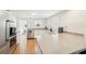 Bright, open kitchen featuring stainless steel appliances, light wood flooring, and ample counter space at 3611 4Th N Ave, St Petersburg, FL 33713