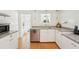 Functional kitchen area with stainless steel appliances and light-colored cabinets, perfect for cooking at 3611 4Th N Ave, St Petersburg, FL 33713