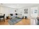 Comfortable living room with a gray sofa, a glass table, and stylish decor at 3611 4Th N Ave, St Petersburg, FL 33713