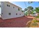 Spacious backyard with mulch ground cover, providing a serene outdoor area with potential for landscaping at 4151 Sunrise S Dr, St Petersburg, FL 33705