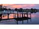 Lovely waterfront dock with seating, perfect for enjoying beautiful sunset views at 4151 Sunrise S Dr, St Petersburg, FL 33705