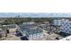 The community from above featuring the city skyline in the background, surrounding trees, and neighborhood amenities at 445 31St N Way, St Petersburg, FL 33713
