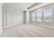 A large, bright bedroom with neutral carpet, paint, and trim; recessed lighting and a ceiling fan at 445 31St N Way, St Petersburg, FL 33713