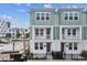 Inviting townhouse with two stories, and charming balconies. Featuring modern architecture and landscaping at 445 31St N Way, St Petersburg, FL 33713