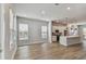 Open concept living room with natural light, recessed lighting, and view of the kitchen with island at 445 31St N Way, St Petersburg, FL 33713