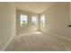Bright bedroom with three windows, clean lines, and plenty of natural light at 5001 21St N Ave, St Petersburg, FL 33710