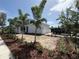 Charming two-story home with landscaped yard and palm trees, showcasing curb appeal at 5001 21St N Ave, St Petersburg, FL 33710