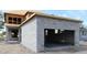 View of the side of the home under construction with a two-car garage at 5001 21St N Ave, St Petersburg, FL 33710