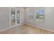 Bright office features wood floors, two windows, and french doors at 5001 21St N Ave, St Petersburg, FL 33710