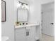 Bathroom featuring modern light fixture and black hardware at 5731 Denver Ne St, St Petersburg, FL 33703