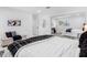 Bedroom featuring a large sliding mirrored closet and modern decorative theme at 5731 Denver Ne St, St Petersburg, FL 33703