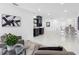 Open-concept living area with marble floors, a bar, and stylish decor at 5731 Denver Ne St, St Petersburg, FL 33703
