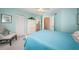 Bright bedroom with walk-in closet, ceiling fan and attached bathroom at 6077 Bahia Del Mar Blvd # 123, St Petersburg, FL 33715