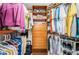 Organized walk-in closet with custom shelving, hanging rods, and drawers at 6077 Bahia Del Mar Blvd # 123, St Petersburg, FL 33715