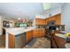 Modern kitchen with stainless steel appliances, tile backsplash, and plenty of counter space at 6077 Bahia Del Mar Blvd # 123, St Petersburg, FL 33715