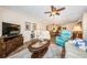Bright, open-concept living room and dining area with comfortable seating and golf course views at 6077 Bahia Del Mar Blvd # 123, St Petersburg, FL 33715