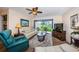 Comfortable living room with golf course view, and bright natural lighting at 6077 Bahia Del Mar Blvd # 123, St Petersburg, FL 33715