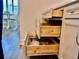 Kitchen drawers provide tiered storage options for kitchenware and accessories at 6293 Bradford Woods Dr, Zephyrhills, FL 33542