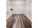 Spacious walk-in closet with ample shelving and rod space, providing plenty of storage for clothes and accessories at 6293 Bradford Woods Dr, Zephyrhills, FL 33542