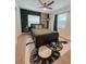 Stylish bedroom with a snake print rug, wood accent wall, and contemporary decor at 7101 N 9Th St, Tampa, FL 33604