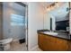 Bathroom features a modern vanity and glass-enclosed shower at 805 100Th N Ave, St Petersburg, FL 33702