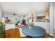 View of living space with dining and kitchen area, with stairs leading to the upper level at 805 100Th N Ave, St Petersburg, FL 33702