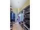 Walk-in closet with shelving and racks, offering ample storage space at 805 100Th N Ave, St Petersburg, FL 33702