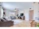 Comfortable living room featuring tile floors, neutral walls, and a ceiling fan at 8798 94Th St, Seminole, FL 33777