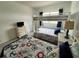 Bright and nautical-themed room with bunk beds and two single beds at 880 Mandalay Ave # C704, Clearwater Beach, FL 33767