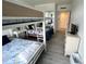 Nautical-themed bunk beds complement the dresser and hall mirror at 880 Mandalay Ave # C704, Clearwater Beach, FL 33767