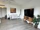 Living area featuring a view to the kitchen and a media center at 880 Mandalay Ave # C704, Clearwater Beach, FL 33767