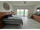 Bedroom featuring balcony access with city views at 880 Mandalay Ave # C704, Clearwater Beach, FL 33767