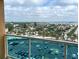 Balcony view featuring parking and waterfront scenery at 880 Mandalay Ave # C704, Clearwater Beach, FL 33767