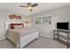 Comfortable bedroom with a queen-sized bed, soft lighting, and a calming atmosphere at 890 Coronado Dr, Punta Gorda, FL 33950