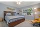 Serene bedroom featuring a full-sized bed, ample natural light, and neutral decor at 890 Coronado Dr, Punta Gorda, FL 33950