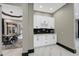 Featuring a butler's pantry with a counter and cabinet, perfect for entertaining guests at 10130 Deercliff Dr, Tampa, FL 33647